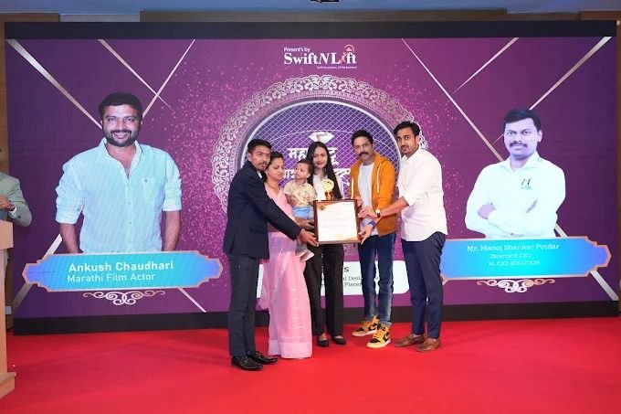 Manoj S. Potdar and family receiving an award on stage